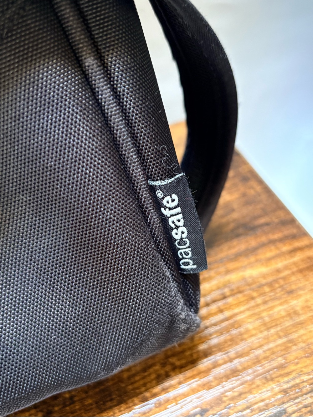 PacSafe | CitySafe Series 100 Travel Crossbody Small Black Handbag w/ eXomesh - Picture 10 of 12